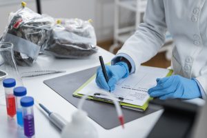 Organic Certification Laboratory. Filling a Form for Organic Certification Procedure Organic Certification Laboratory. Filling a Form for Organic Certification Procedure in Laboratory